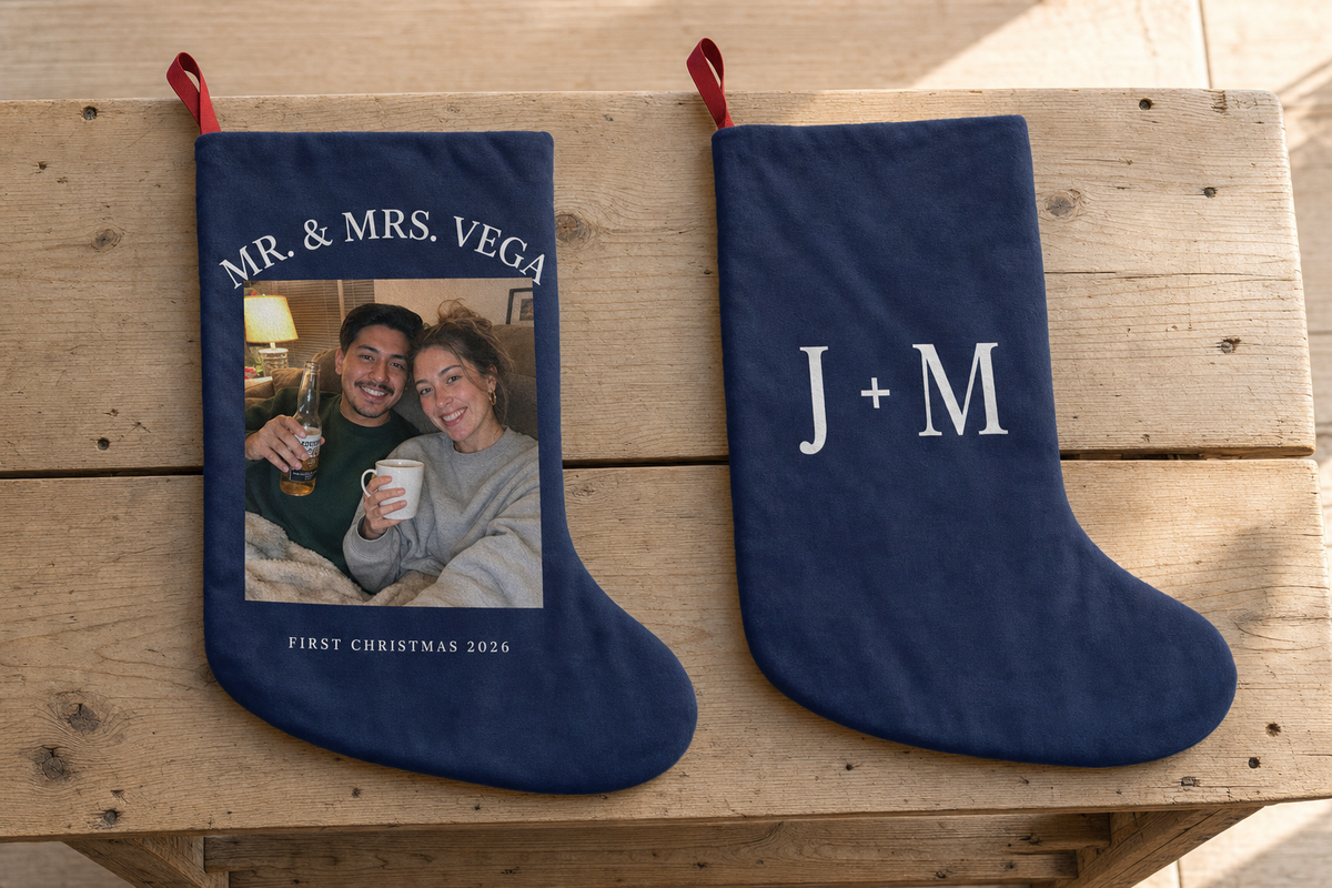 Front and back of one personalized stocking showing a couple's photo on the front and their initials on the back