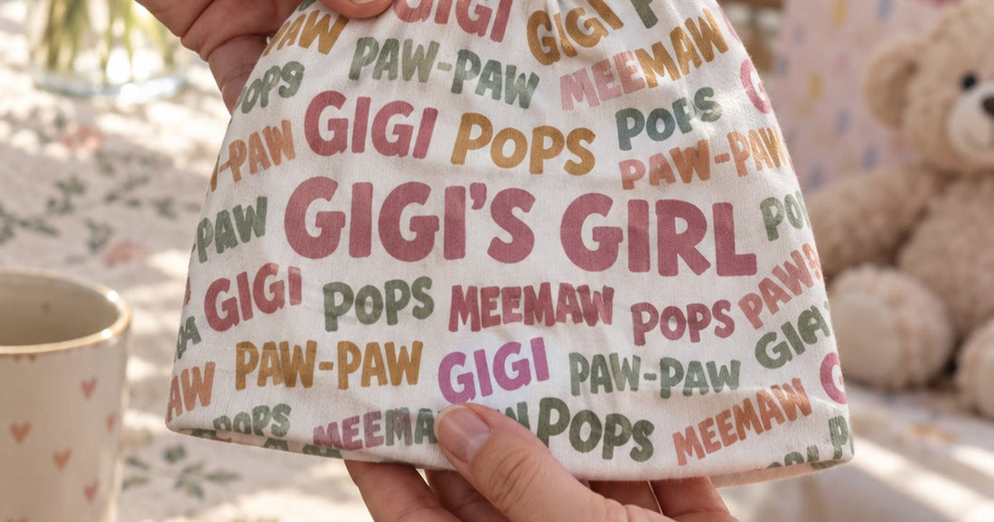 Personalized baby beanie printed with family nicknames and held in a nursery setting.