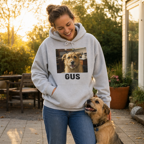 Custom photo hoodie printed with a candid dog photo, worn outdoors at golden hour