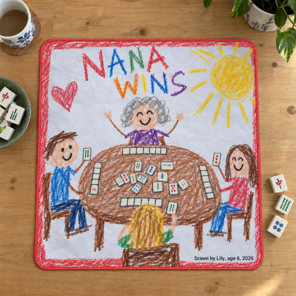 Mahjong mat printed edge to edge with a child's crayon drawing titled Nana Wins
