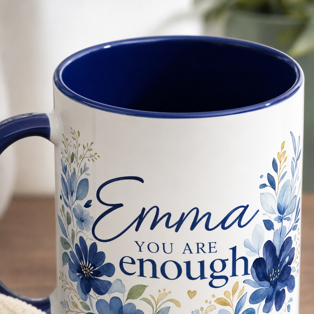 Close view over the rim of an accent mug showing the colored interior and handle