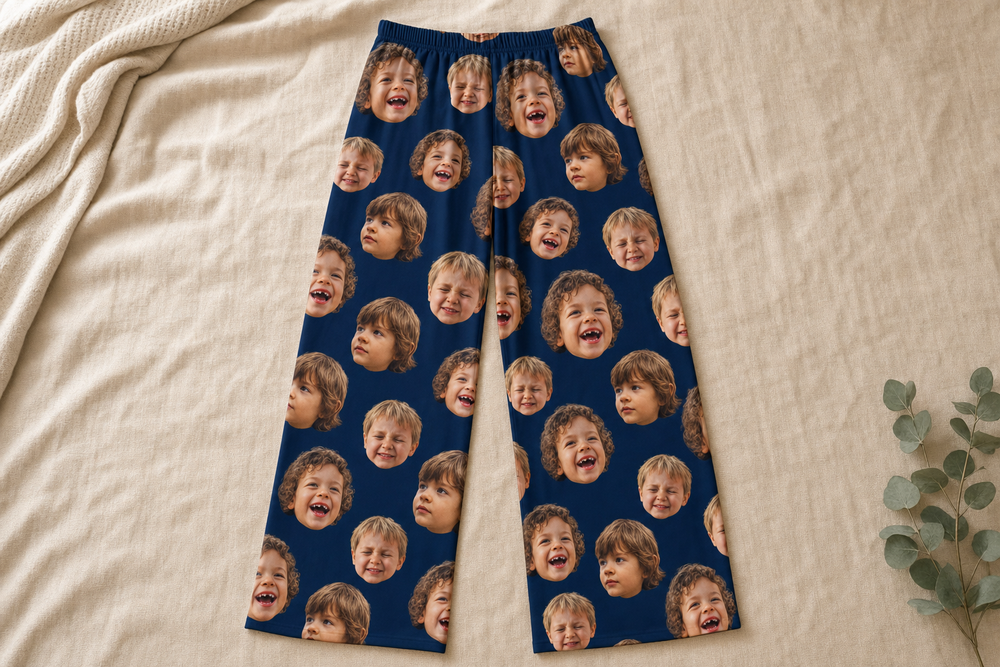 Custom pajama pants with a terrier photo design, flat on linen