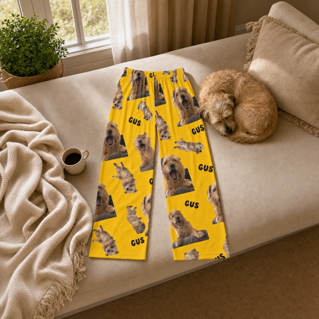 Custom pajama pants with a terrier photo design on a daybed in morning light, full pair with margin