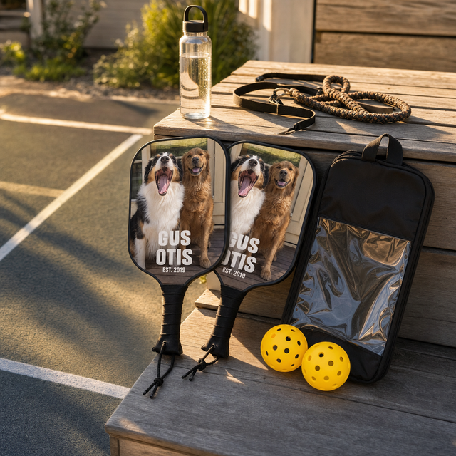 Custom pickleball set with two matching personalized paddles, balls, and a carry bag
