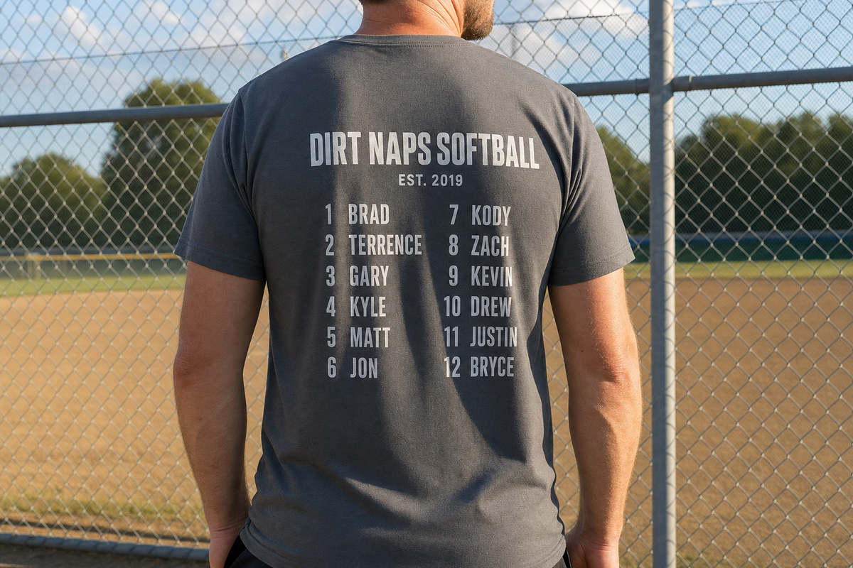 The back of an asphalt grey custom t-shirt printed with a rec-league team name and player roster