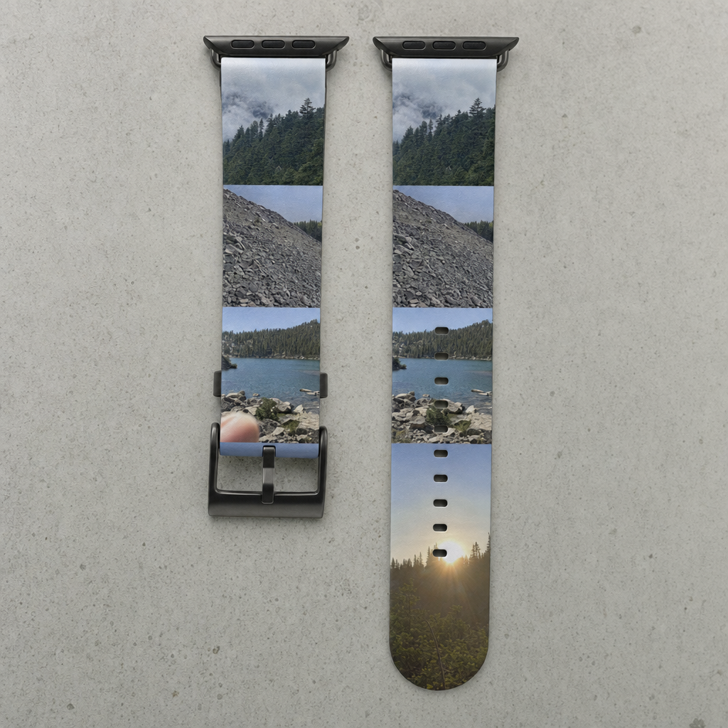 Both pieces of a custom Apple Watch band laid flat, printed edge to edge with a stack of hiking photos