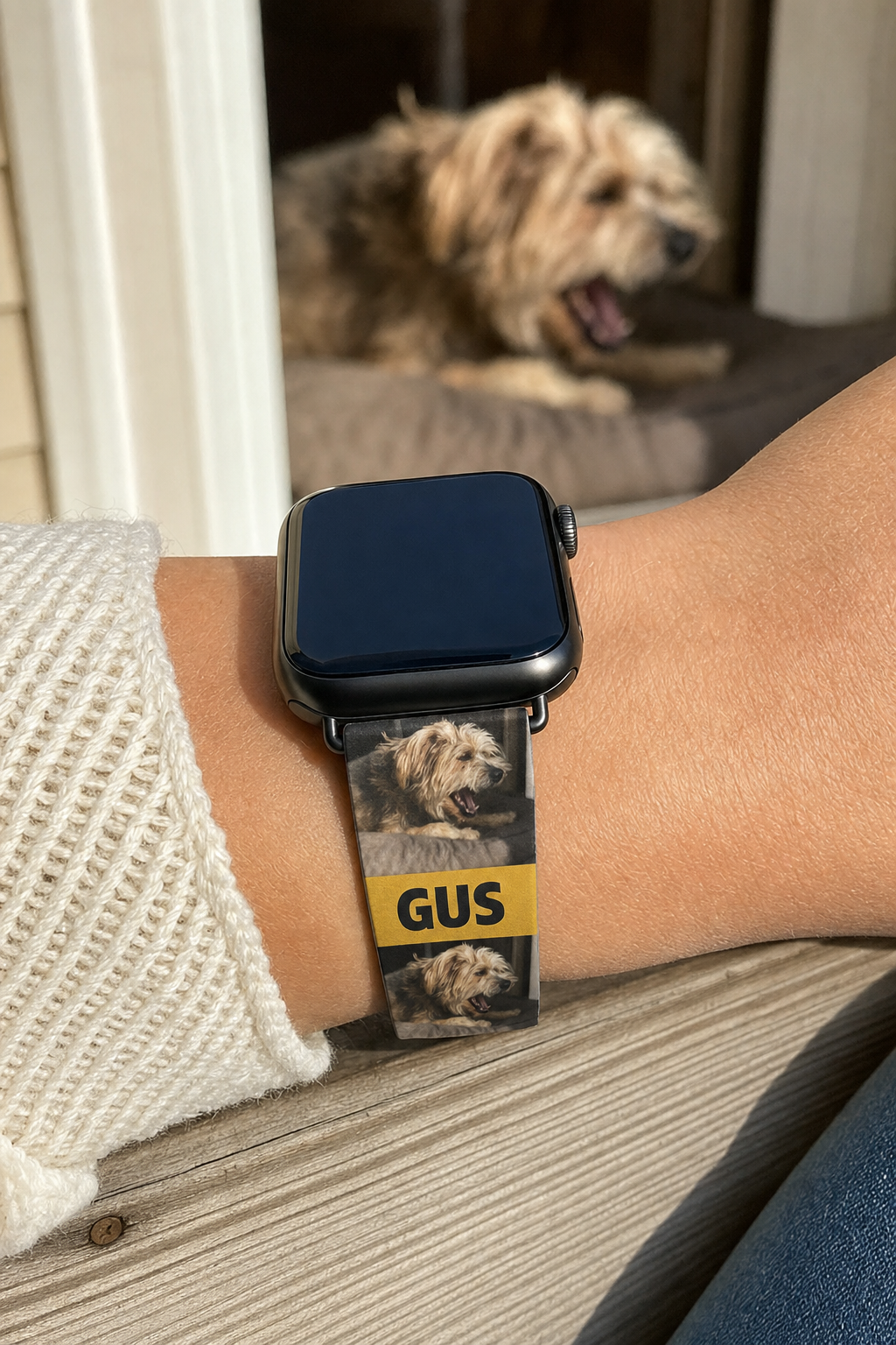 Custom Apple Watch band with a repeating terrier photo worn on a wrist on a porch step