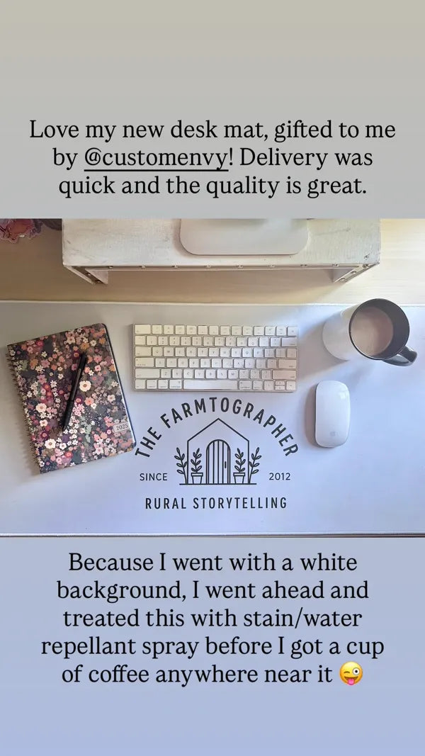 Custom business logo desk mat on clean minimalist desk with keyboard and coffee