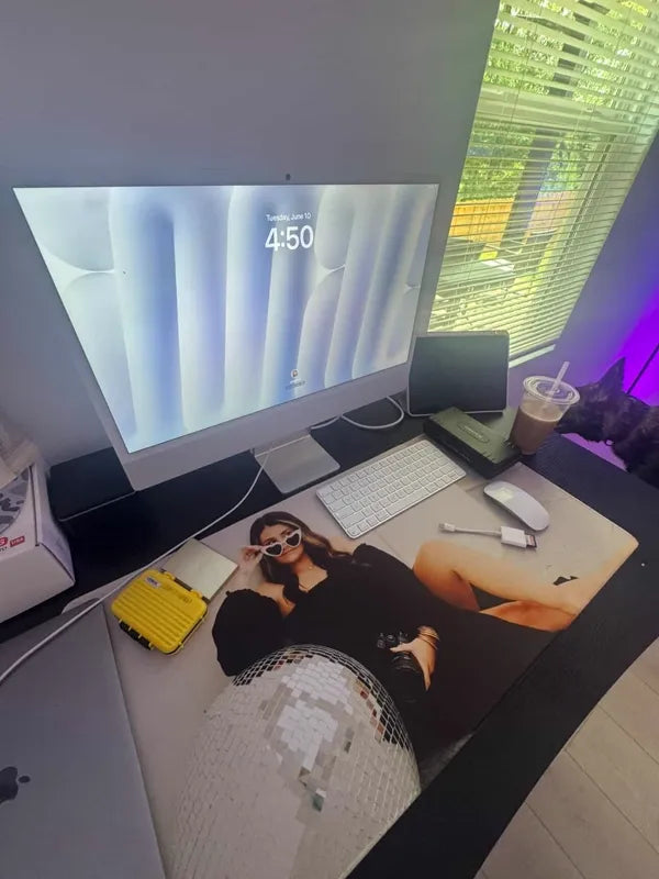 Portrait photo desk mat with keyboard under monitor with purple LED lighting